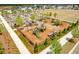 The picture showcases the community playground with various play structures and picnic benches, perfect for Gathering outings at 208 Evergreen Ave, Summerville, SC 29485