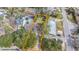 Aerial view of the property, showcasing its boundaries, nearby street, and surrounding trees at 209 E 1St N St, Summerville, SC 29483