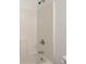 Clean shower-tub combo features neutral surround, chrome fixtures, and shower head at 209 E 1St N St, Summerville, SC 29483