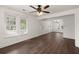 Dining room featuring hardwood floors, neutral walls, a modern chandelier, and natural light at 209 E 1St N St, Summerville, SC 29483