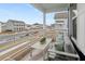 Relaxing balcony area with comfortable seating, and views of the neighborhood at 219 Symphony Ave, Summerville, SC 29486