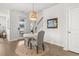 Dining area with a circular table, and an outdoor patio through the glass door at 219 Symphony Ave, Summerville, SC 29486