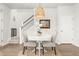 Dining area with table and seats near the staircase at 219 Symphony Ave, Summerville, SC 29486