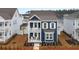 Attractive two-story blue home featuring double porches and neat landscaping at 219 Symphony Ave, Summerville, SC 29486