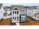 Beautiful two-story home with double porches, showcasing its charming curb appeal at 219 Symphony Ave, Summerville, SC 29486