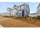 A view of the home from the side showing a dual porch at 219 Symphony Ave, Summerville, SC 29486