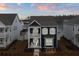 Inviting blue two-story home with dual porches, offering curb appeal and outdoor living at 219 Symphony Ave, Summerville, SC 29486