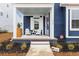 Charming front porch features seating, a colorful door, and a welcoming atmosphere at 219 Symphony Ave, Summerville, SC 29486