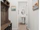 Hallway with decor leading to a powder room at 219 Symphony Ave, Summerville, SC 29486