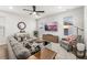 Bright living room with stylish decor, comfortable seating, and a large-screen television at 219 Symphony Ave, Summerville, SC 29486