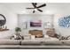 Cozy living room featuring modern decor, sectional sofa, and entertainment center at 219 Symphony Ave, Summerville, SC 29486