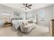 Bright main bedroom featuring stylish furniture, ample natural light, and a calming color palette at 219 Symphony Ave, Summerville, SC 29486