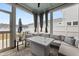 Screened porch featuring outdoor seating, a fire pit, and sliding glass doors for year-round enjoyment at 219 Symphony Ave, Summerville, SC 29486