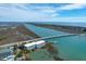 Coastal condo building with private dock, stunning Intracoastal waterway views and a nearby bridge at 2395 Folly Road # 4H, Folly Beach, SC 29439