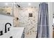 Bathroom with shower featuring a rainfall shower head and modern fixtures at 2395 Folly Road # 4H, Folly Beach, SC 29439