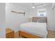 Bright bedroom with a queen bed, ceiling fan, and a window with plenty of natural light at 2395 Folly Road # 4H, Folly Beach, SC 29439