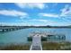 Exterior shot of a wooden dock leading to a small marina, offering direct water access and scenic views at 2395 Folly Road # 4H, Folly Beach, SC 29439