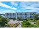 Beautiful view of the Twin Rivers Condominiums with well maintained landscaping and plenty of parking space at 2395 Folly Road # 4H, Folly Beach, SC 29439