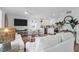 Open-concept living space with modern decor seamlessly connecting the living and kitchen areas at 2395 Folly Road # 4H, Folly Beach, SC 29439