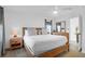 Inviting main bedroom with a large bed, ceiling fan, and bright natural light at 2395 Folly Road # 4H, Folly Beach, SC 29439