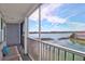 Relaxing screened porch with comfortable seating and picturesque waterfront views at 2395 Folly Road # 4H, Folly Beach, SC 29439