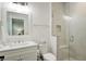 Bright bathroom featuring a glass enclosed shower and a large, framed mirror at 27 22Nd Ave, Isle of Palms, SC 29451
