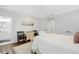 Spacious bedroom boasts hardwood floors, ensuite bathroom, and closet at 27 22Nd Ave, Isle of Palms, SC 29451