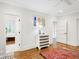 Bedroom featuring hardwood floors, colorful decor, and bright natural light at 27 22Nd Ave, Isle of Palms, SC 29451