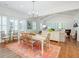 Inviting dining space filled with natural light, complemented by elegant furnishings and a cozy atmosphere at 27 22Nd Ave, Isle of Palms, SC 29451