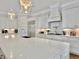 Beautiful kitchen with large island with gorgeous countertops, stainless steel appliances, and ample storage at 27 22Nd Ave, Isle of Palms, SC 29451