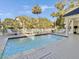 Private backyard swimming pool with decking and outdoor seating for luxurious outdoor living at 27 22Nd Ave, Isle of Palms, SC 29451