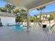 Inviting outdoor pool area with deck and lounging area at 27 22Nd Ave, Isle of Palms, SC 29451
