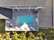 Overhead shot of a backyard pool with a deck, surrounded by lush greenery at 27 22Nd Ave, Isle of Palms, SC 29451