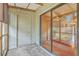Spacious covered patio with sliding glass door and access to outdoor storage at 2765 Jobee Dr # 1304, Charleston, SC 29414