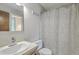 Bright bathroom featuring a vanity sink, toilet, and shower with decorative curtain at 2765 Jobee Dr # 1304, Charleston, SC 29414