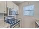Updated kitchen featuring granite countertops, stainless steel appliances, and modern fixtures at 2765 Jobee Dr # 1304, Charleston, SC 29414