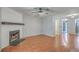 Spacious living room featuring hardwood floors, a fireplace, and contemporary lighting fixtures at 2765 Jobee Dr # 1304, Charleston, SC 29414