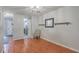 Open-concept living room features hardwood floors, ceiling fan, bright lighting, and neutral walls at 2765 Jobee Dr # 1304, Charleston, SC 29414