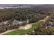 Beautiful aerial view of a neighborhood and golf course, nestled among lush greenery at 2784 Hidden Oak Dr, Seabrook Island, SC 29455