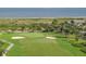 Expansive golf course with ocean views, lush green fairways, sand bunkers, and palm trees at 2784 Hidden Oak Dr, Seabrook Island, SC 29455