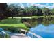 Beautiful golf course alongside the water with a wooden bridge and sand traps at 2784 Hidden Oak Dr, Seabrook Island, SC 29455