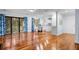 Open living space with hardwood floors, dining area, and sliding doors to the deck at 2784 Hidden Oak Dr, Seabrook Island, SC 29455