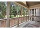 Inviting porch with golf course views, offering a serene outdoor space for relaxation and entertainment at 2784 Hidden Oak Dr, Seabrook Island, SC 29455