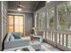 Comfortable screened porch with seating, offering relaxation and views of the surrounding lush greenery at 2784 Hidden Oak Dr, Seabrook Island, SC 29455