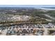 An elevated view displays a suburban neighborhood near a river and marsh, highlighting community layout at 2942 Clearwater Dr, Mount Pleasant, SC 29466