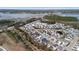 An aerial perspective of a neighborhood near a river, featuring a variety of house styles and a natural setting at 2942 Clearwater Dr, Mount Pleasant, SC 29466