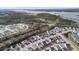 A birds-eye view of a neighborhood showcasing charming homes near a scenic river and marshland at 2942 Clearwater Dr, Mount Pleasant, SC 29466