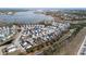 Panoramic view of a suburban community close to a river, showcasing homes, streets, and the surrounding natural beauty at 2942 Clearwater Dr, Mount Pleasant, SC 29466