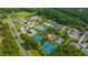 Aerial view of neighborhood amenities; pools, clubhouse, tennis courts, and parking at 2942 Clearwater Dr, Mount Pleasant, SC 29466