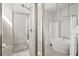 Bright bathroom featuring a glass shower and a standalone soaking tub at 2942 Clearwater Dr, Mount Pleasant, SC 29466